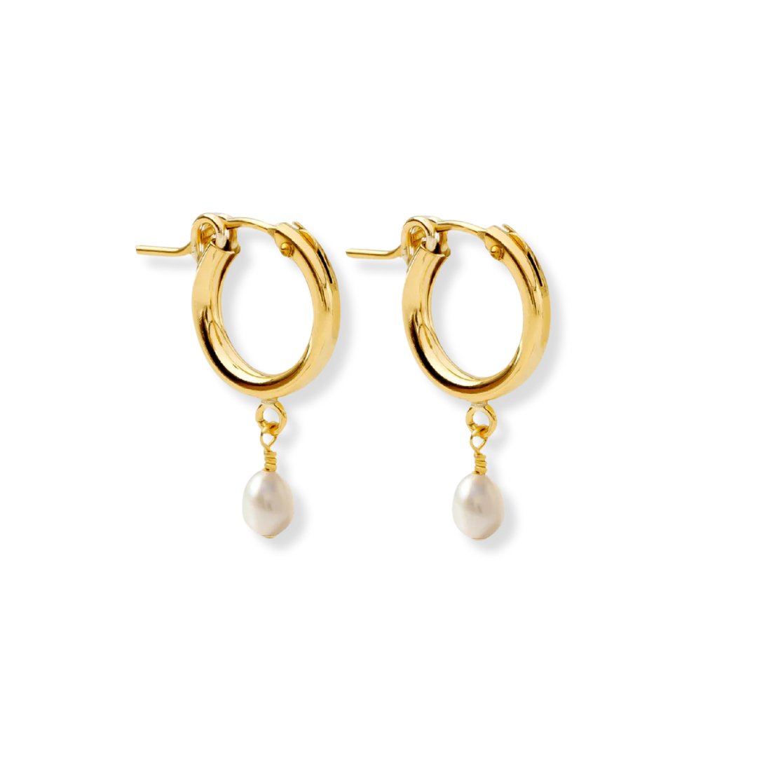 Gold huggie hoop earrings with tiny pearl drop charms by Le Serey