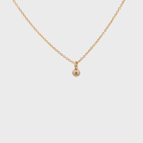 Load and play video in Gallery viewer, Tiny Gold Drop Necklace
